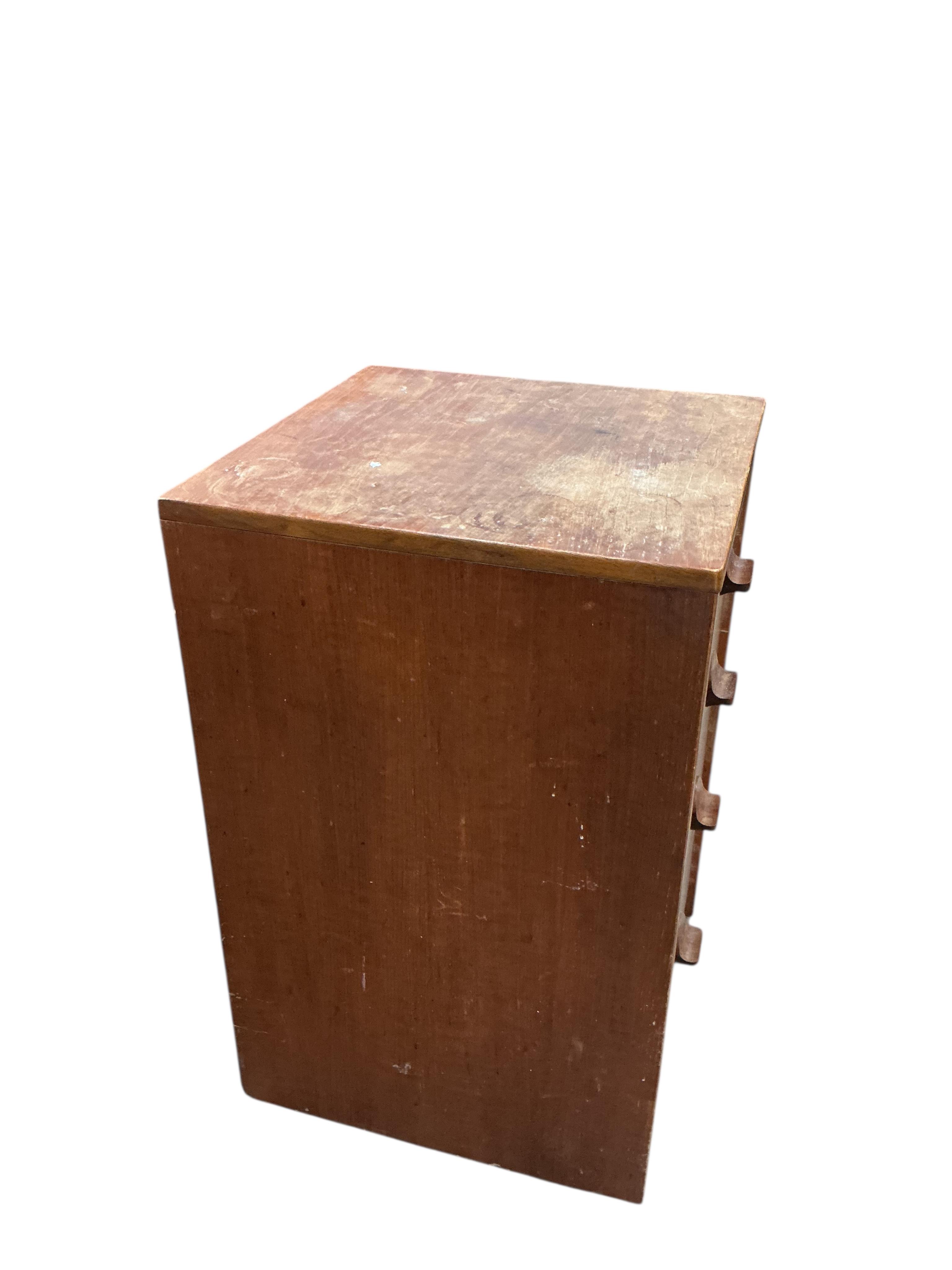 A small mid century Stag teak three drawer chest and a four drawer chest, larger width 80cm, depth 43cm, height 63cm
